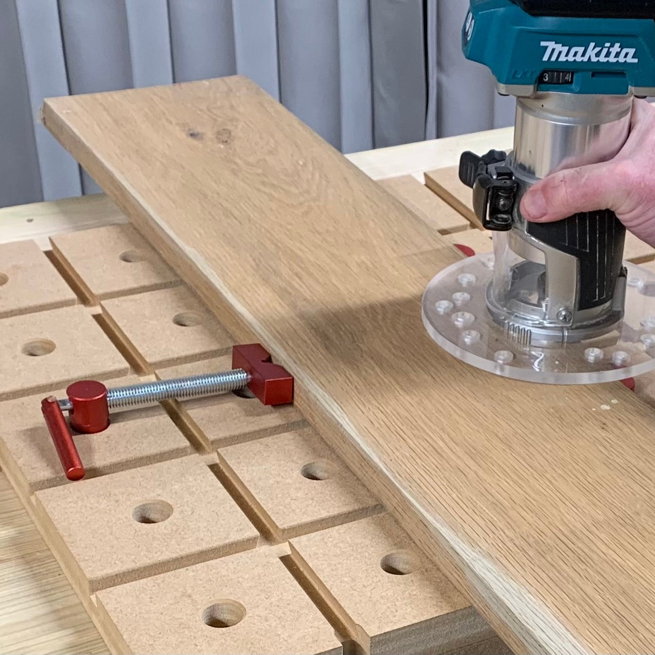 Using Makita DRT50ZJ router with HDS Hold Down System portable workbench