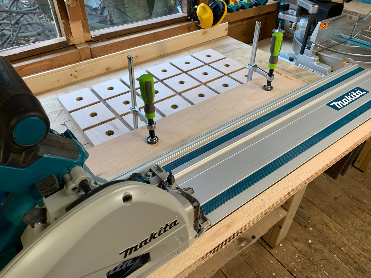 Grade B HDS Hold Down System clamps the workpiece securely whilst trimming material using the Makita DSP600ZJ Track Saw