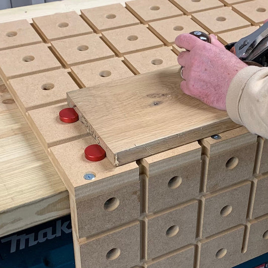 Bench dogs in use on the HDS Portable Workbench — 20mm round bench dogs, Whaley Woodworks