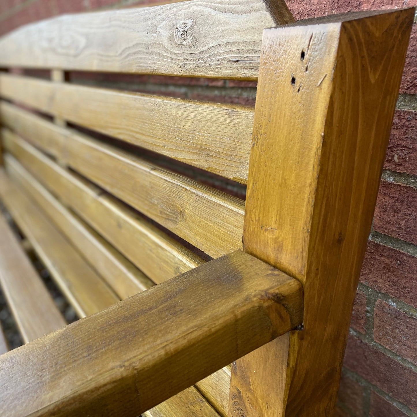 Handmade medium oak garden bench, side profile view