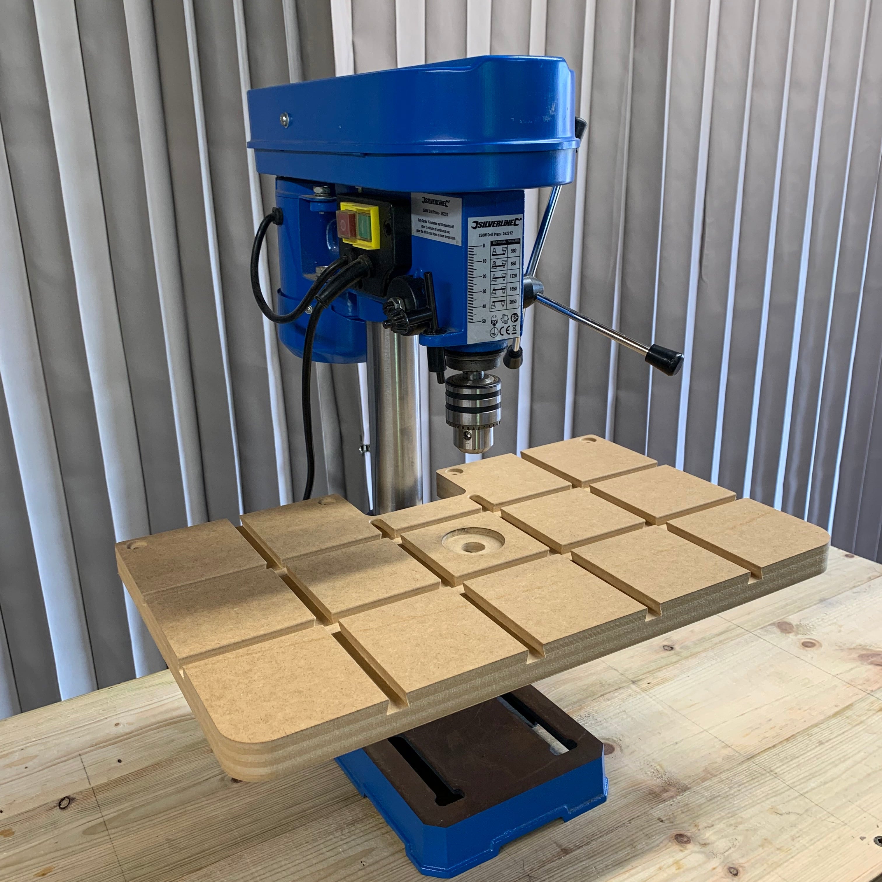 HDS Drill Table Top Starter Pack fitted on pillar drill with Low Profile Track Clamps securing workpiece – Whaley Woodworks