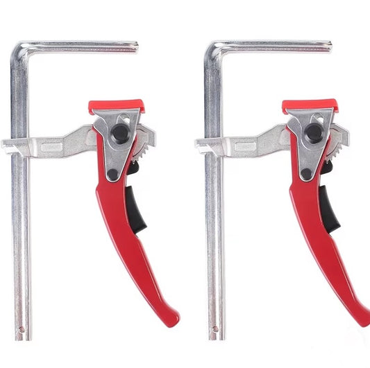 HDS Quick ratchet track table clamps with red handles on a white background
