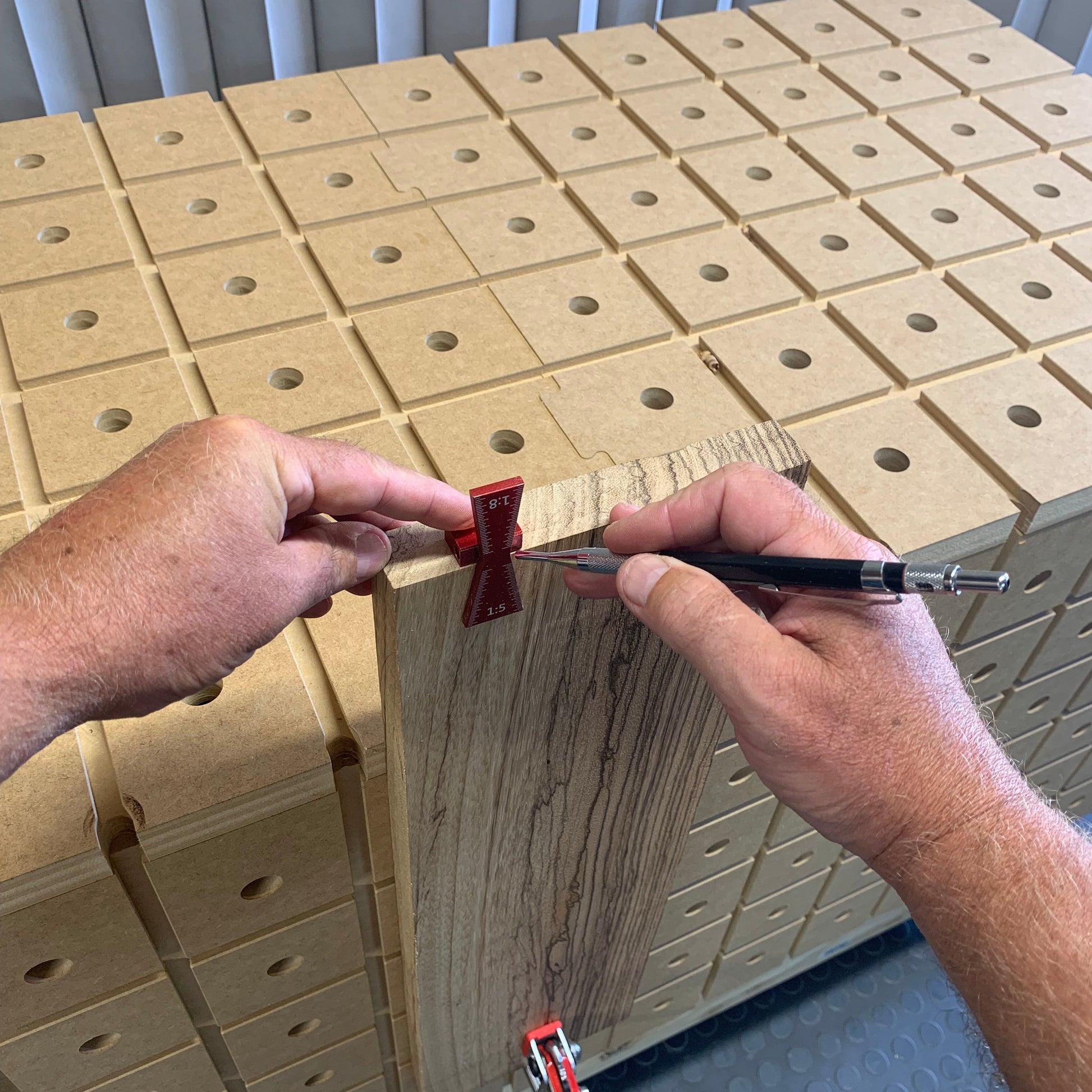 HDS Workbench Top Master Pack – close-up of board clamped vertically against the workbench edge using the hold down system, made in the UK