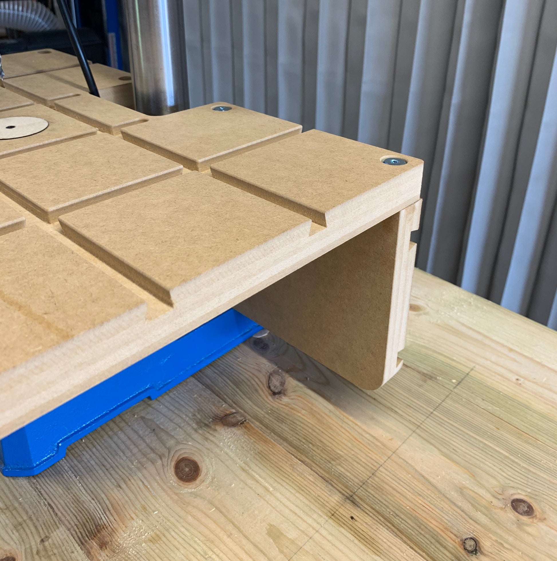 HDS Vertical Fence Board — side view showing attachment to Drill Table To